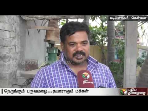 Residents in Chennai preparing to face the monsoon rain