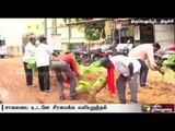 Protest by residents planting plantain saplings on the road full of pot holes
