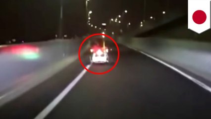 Man drives Mario Kart over Tokyo Highway