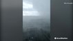 Timelapse of storm drenching town in rain