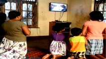 With churches still shut after bombings, Sri Lankans watch mass on TV