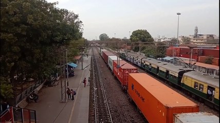 Amazing view of Rajdhani Express Passing between 2 train's