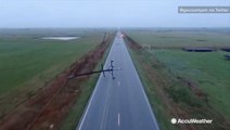 Thunderstorm sends power lines crashing down onto road