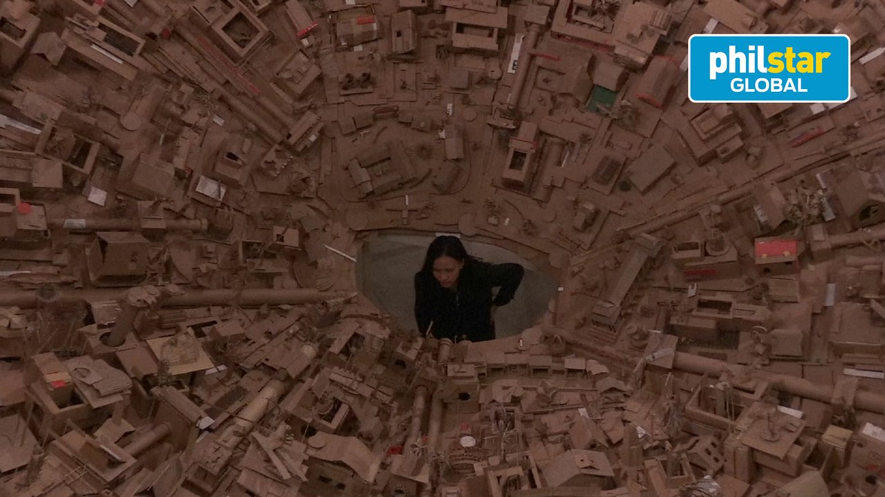 Intricate cardboard city rises in Manila art show