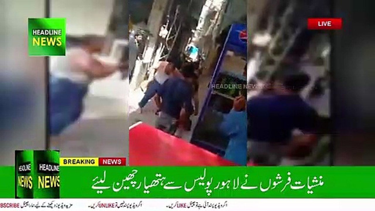 Alleged drug dealers snatch guns from police in Lahore | drug dealers snatch guns from police