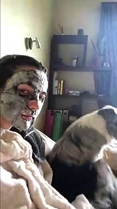 This pup got extra concerned about her owner's new face mask