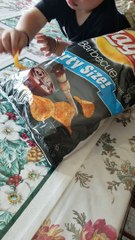 Boys Munch on Chips and Make Believe Dip