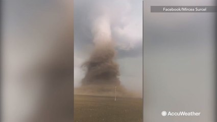 Man captures breathtaking video of monstrous tornado roaring through field in Romania