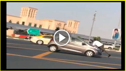 Woman drives away with valet worker still on bonnet in Dubai...