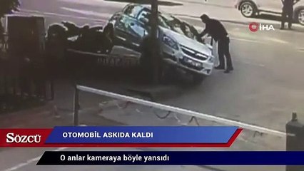 Otomobil askıda kaldı, o anlar kameraya böyle yansıdı