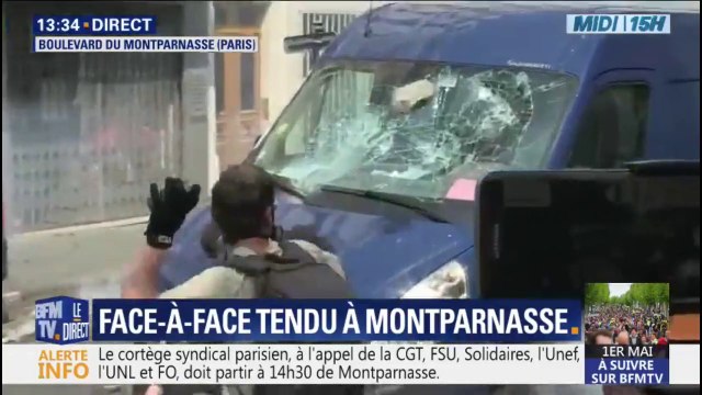1er-mai à Paris: une camionnette est prise pour cible par des casseurs