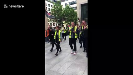 Employees of the catering service for London’s Facebook headquarters hold protest