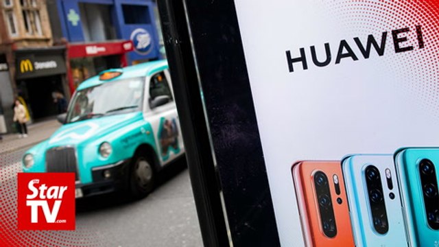 UK PM May fires defense minister over Huawei leak