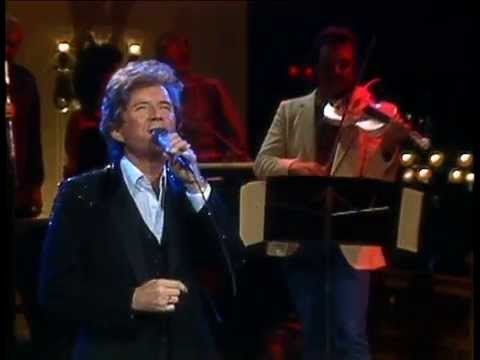 Johnny Tillotson - It Keeps You Right On Hurtin'