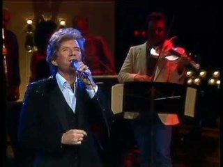 Johnny Tillotson - It Keeps You Right On Hurtin'