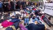 CND activists stage die-in protest outside Westminster Abbey in London