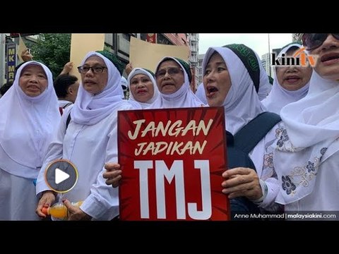 Baju T dan plakad pertahan kedaulatan Islam dan TMJ