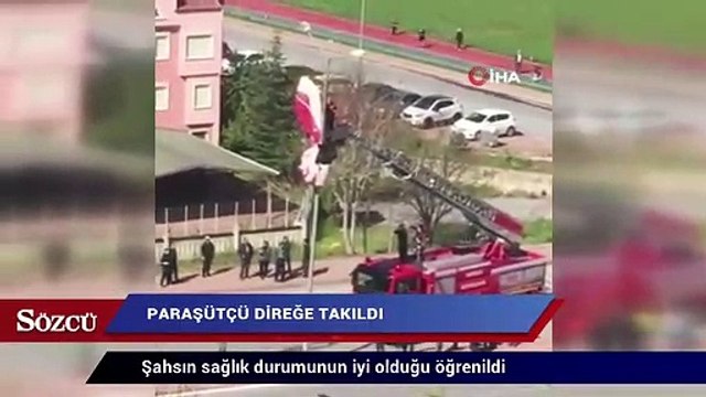 Paraşütçü direğe takıldı, itfaiye kurtardı
