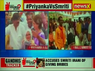 Lok Sabha Elections 2019: Priyanka Gandhi vs Smriti Irani over Cash for Vote charge, BJP vs Congress