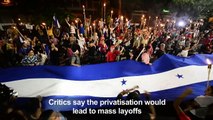 Thousands march in Honduras to protest presidency