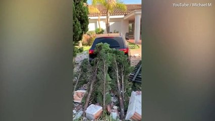 Irish boy smashes through wall after loosing control of dad's car