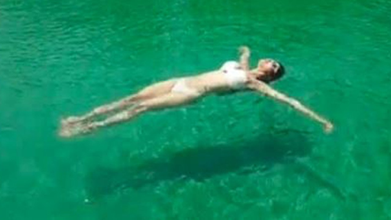 Mouni Roy stuns in white bikini; Check out here | FilmiBeat