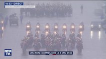 Le président de la République remonte les Champs-Élysées dans le calme et sous la pluie