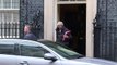 Theresa May departs Downing Street for PMQs