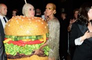 Katy Perry falls over dressed as hamburger