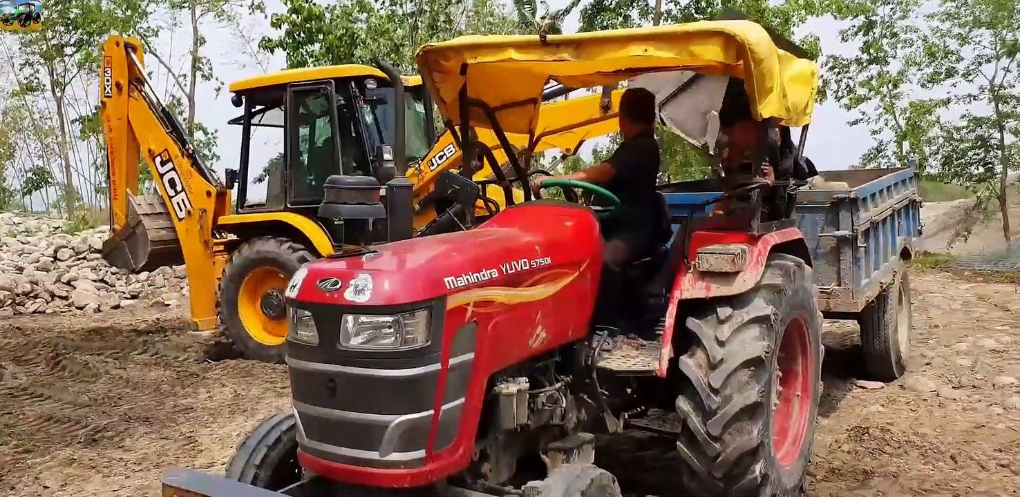 Backhoe Loading Stone in Tractor(1)