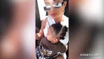 Stormi Webster Clings to Mama Kylie On the Jetway