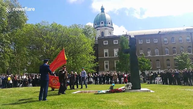 People gather at London's Imperial War Museum to commemorate Victory Day