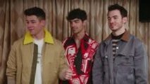 Kate McKinnon Enlists Jonas Brothers to Replace Broken Record Player in 'SNL' Promo | Billboard News