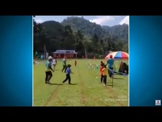 Download Video: Niño se equivoca de dirección en carrera de relevos | Qué Importa