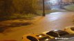 Heavy rain floods streets on college campus