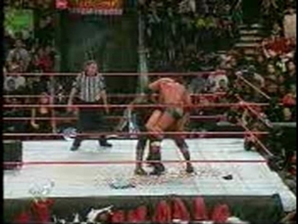 WWE - HHH Pedigrees Mick Foley On Thumbtacks