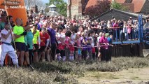 Hundreds of fancy-dress competitors get filthy in the annual Maldon Mud Race