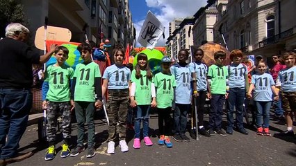 Children lead climate change marches across Europe