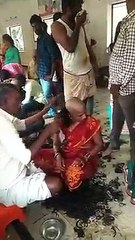 Red Saree lady head shave