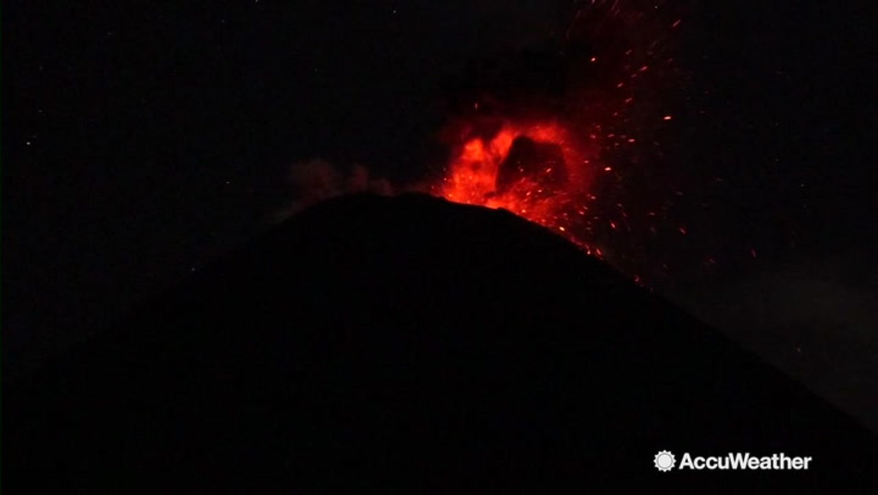 Volcano violently erupts spewing ash and smoke into the sky