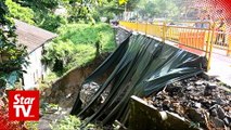 Cracked drain in Tanjung Bungah caused by road cave-in