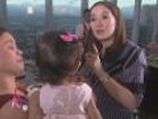 Kris grants a mom's wish to the 1st snip of daughter's hair.