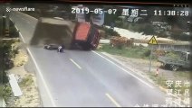 Transport truck flips over trying to avoid scooter riders, only to bury them in sand