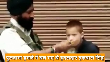 CRPF Havaldar Iqbal Singh (Survivor of Pulwama terror attack) feeds his lunch to a paralytic child