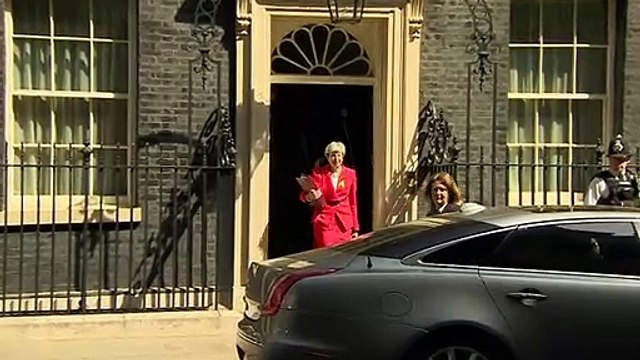Theresa May departs Downing Street for PMQs