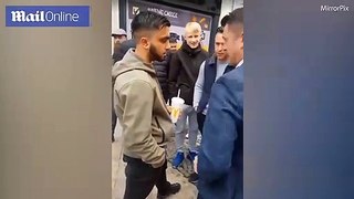 Tommy Robinson swings at protestor after being hit with milkshake