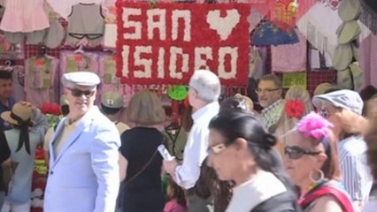 San Isidro, solemne y popular, entre el himno nacional y el chotis