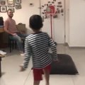Little Boy Does Bicycle Kick and Shoots Soccer Ball Through Hoop