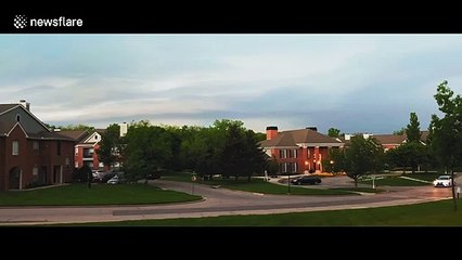 Kansas City suburb shrouded in darkness as storm clouds approach