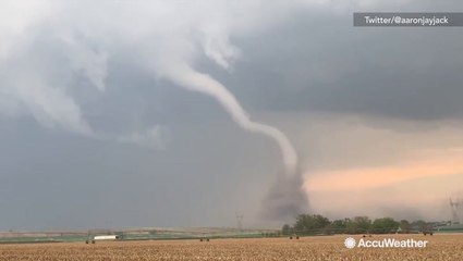 Spectacular footage of twister as it touches down in field